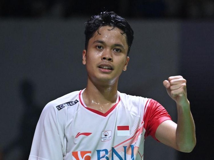 Anthony Sinisuka Ginting of Indonesia reacts after winning against Lee Zii Jia of Malaysia during the mens singles quarter-finals at Indonesia Masters badminton tournament in Jakarta on June 10, 2022. (Photo by ADEK BERRY / AFP) (Photo by ADEK BERRY/AFP via Getty Images)
