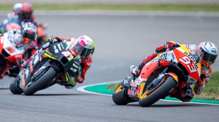 20 June 2021, Saxony, Hohenstein-Ernstthal: Motorsport/Motorcycle, German Grand Prix, MotoGP at the Sachsenring: Marc Marquez from Spain of the Repsol Honda Team leads the field. Marquez wins the race. Photo: Jens Büttner/dpa-Zentralbild/dpa (Photo by Jens Büttner/picture alliance via Getty Images)