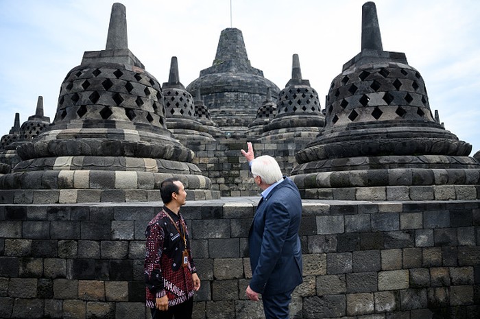 17 June 2022, Indonesia, Yogyakarta: German President Frank-Walter Steinmeier will be guided through the Borobudur temple complex. The approximately 1200-year-old step-shaped temple is considered the most important Buddhist building on Java and the largest Buddhist temple in the world. It has been a Unesco World Heritage Site since 1991. President Steinmeier is on a two-day visit to Indonesia. He was previously in Singapore for two days. Photo: Bernd von Jutrczenka/dpa (Photo by Bernd von Jutrczenka/picture alliance via Getty Images)