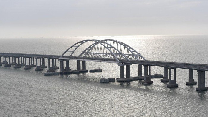 A view of the new bridge across the Kerch Strait linking Russias Taman Peninsula with Crimea, after regular traffic began, in Kerch, Crimea, Wednesday, May 16, 2018. The 19-kilometer (11.8-mile) bridge, which took two years to build and cost $3.6 billion is Putins project to show that Crimea has joined Russia for good. (AP Photo)