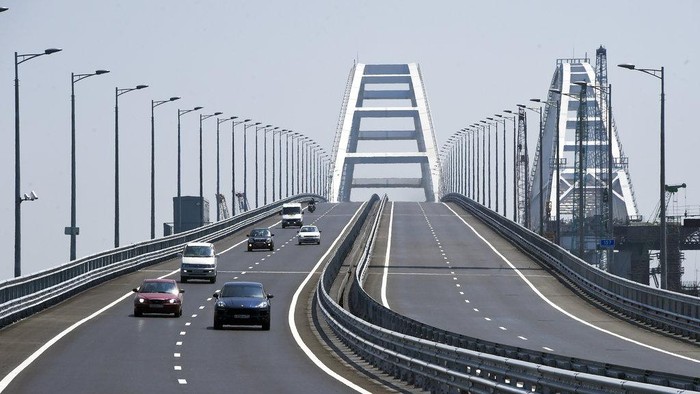 A view of the new bridge across the Kerch Strait linking Russia's Taman Peninsula with Crimea, after regular traffic began, in Kerch, Crimea, Wednesday, May 16, 2018. The 19-kilometer (11.8-mile) bridge, which took two years to build and cost $3.6 billion is Putin's project to show that Crimea has joined Russia for good. (AP Photo)