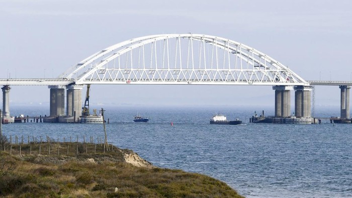 A view of the new bridge across the Kerch Strait linking Russia's Taman Peninsula with Crimea, after regular traffic began, in Kerch, Crimea, Wednesday, May 16, 2018. The 19-kilometer (11.8-mile) bridge, which took two years to build and cost $3.6 billion is Putin's project to show that Crimea has joined Russia for good. (AP Photo)