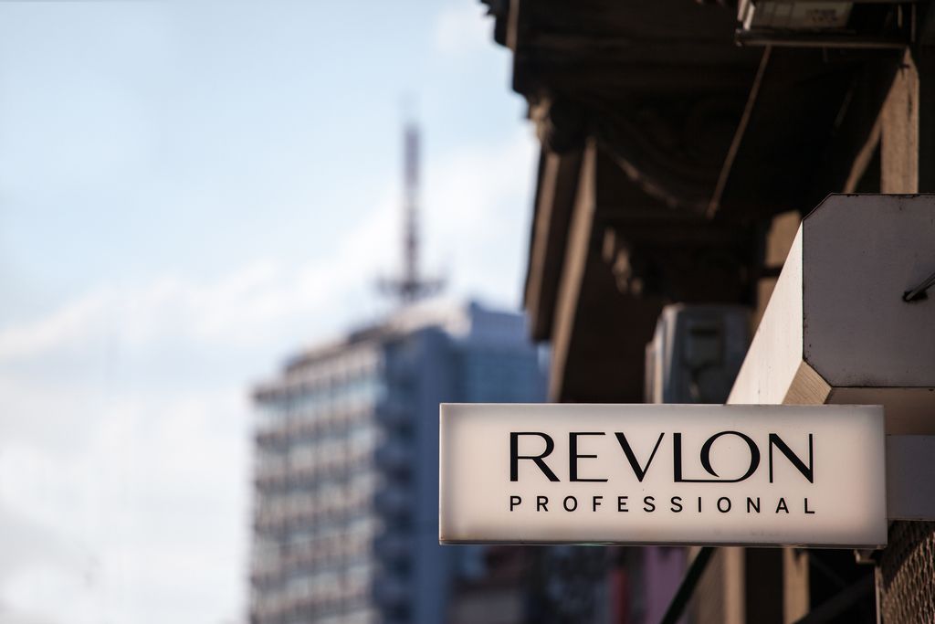 Picture of the Revlon professional sign with their logo on their retailer for Belgrade. Revlon is an American multinational cosmetics, skin care, fragrance, and personal care company