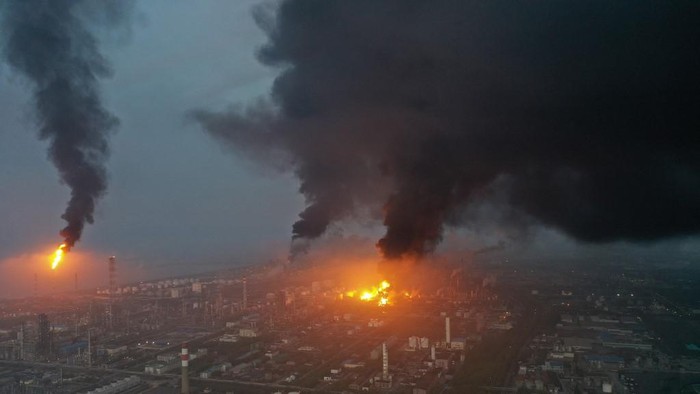 This aerial photo taken on June 18, 2022 shows a large fire at a Sinopec Shanghai Petrochemical plant in outlying Jinshan district of Shanghai. (Photo by CNS / AFP) / China OUT