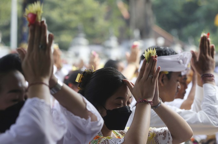 Young female dancers stand by for their performance during the Kuningan festival at Sakenan temple in Bali, Indonesia, Saturday, June 18, 2022. Kuningan marks the last day of Galungan celebrations, one of Balinese Hinduisms biggest religious ceremonies.(AP Photo/Firdia Lisnawati)