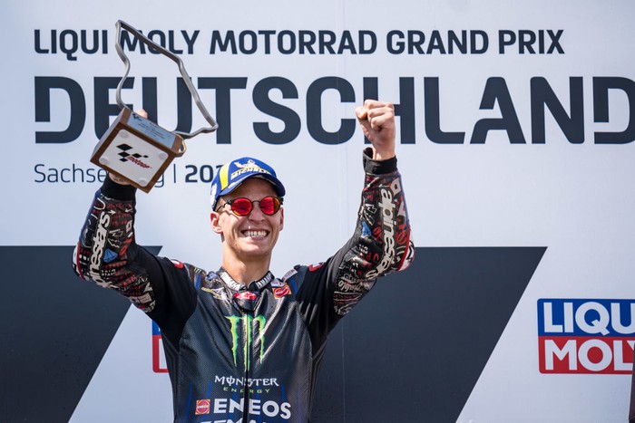 HOHENSTEIN-ERNSTTHAL, GERMANY - JUNE 19: Fabio Quartararo of France and Monster Energy Yamaha MotoGP celebrates with his trophy during the race of the MotoGP Liqui Moly Motorrad Grand Prix Deutschland at Sachsenring Circuit on June 19, 2022 in Hohenstein-Ernstthal, Germany. (Photo by Steve Wobser/Getty Images)