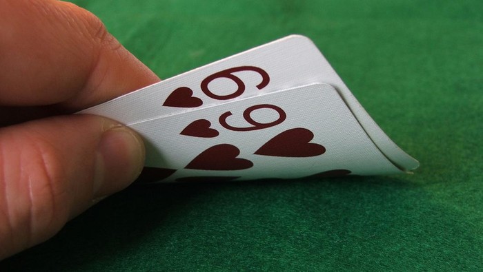 A Texas Holdem hand of Six, Nine (of hearts), or 
