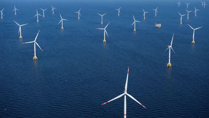TOPSHOT - This aerial photograph taken on June 16, 2022, shows a wind turbine farm in the Baltic Sea, north-east of Rugen Island in Germany. (Photo by FRED TANNEAU / AFP) (Photo by FRED TANNEAU/AFP via Getty Images)