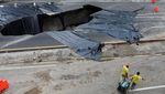 Kala Sinkhole di Tengah Jalan Guatemala Jadi Objek Foto Warga