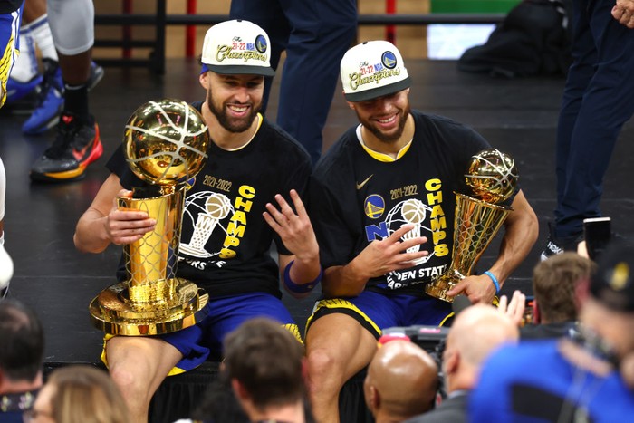 BOSTON, MASSACHUSETTS - JUNE 16: Klay Thompson #11 and Stephen Curry #30 of the Golden State Warriors pose for a photo after defeating the Boston Celtics 103-90 in Game Six of the 2022 NBA Finals at TD Garden on June 16, 2022 in Boston, Massachusetts. NOTE TO USER: User expressly acknowledges and agrees that, by downloading and/or using this photograph, User is consenting to the terms and conditions of the Getty Images License Agreement. (Photo by Adam Glanzman/Getty Images)