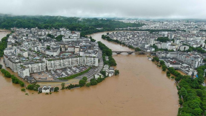 SHANGRAO, CHINA - JUNE 21: Aerial view of residential houses submerged in flood water on June 21, 2022 in Shangrao, Jiangxi Province of China. China's Jiangxi Province on Monday issued a red alert for floods. (Photo by Ai Shimin/VCG via Getty Images)