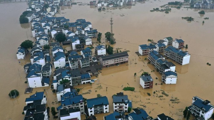 SHANGRAO, CHINA - JUNE 21: Aerial view of residential houses submerged in flood water on June 21, 2022 in Shangrao, Jiangxi Province of China. China's Jiangxi Province on Monday issued a red alert for floods. (Photo by Ai Shimin/VCG via Getty Images)