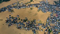 Foto drone memperlihatkan kawasan Shangrao, Jiangxi, yang terendam banjir pada, Selasa (21/6/2022). Kawasan ini sekitar 1.400 km sebelah selatan Ibu Kota Beijing.