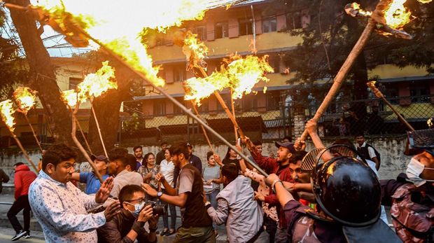 Student activists clash with police during a protest over hike in fuel prices in Kathmandu on June 20, 2022. (Photo by PRAKASH MATHEMA / AFP) (Photo by PRAKASH MATHEMA/AFP via Getty Images)