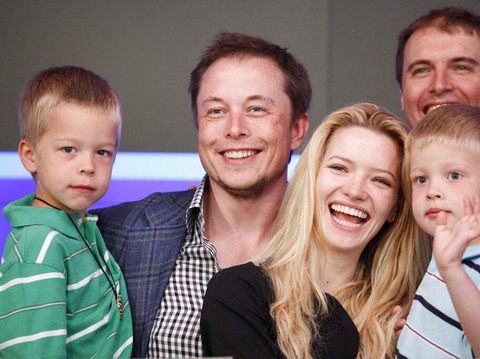 Elon Musk, CEO of Tesla Motors, stands with his fiancee Talulah Riley and his twin sons Griffin, left, 6, and Xavier at the Nasdaq's opening bell to celebrate the electric automaker's initial public offering, Tuesday, June, 29, 2010, in New York. (AP Photo/Mark Lennihan)