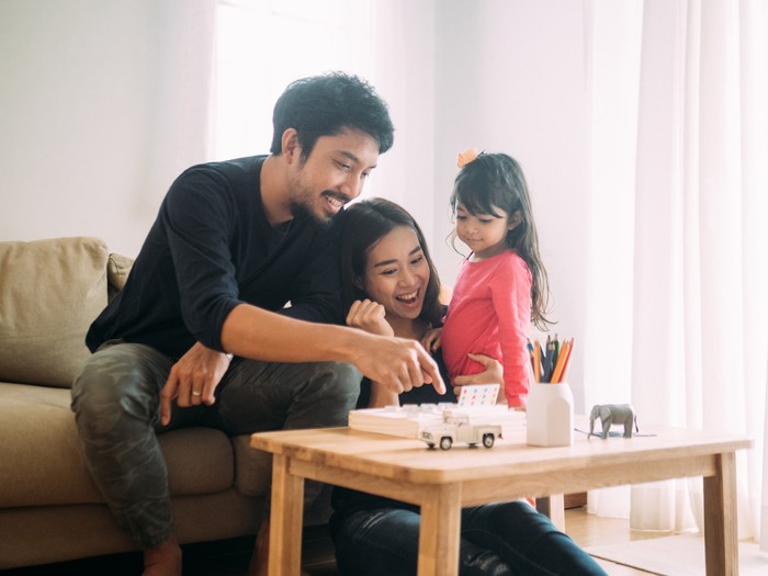 Ilustrasi keluarga bermain board game