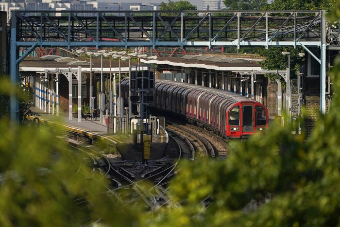 A near empty Liverpool Street station, in London, Tuesday, June 21, 2022. Britains biggest rail strike in decades went ahead Tuesday after last-minute talks between a union and train companies failed to reach a settlement over pay and job security. Up to 40,000 cleaners, signalers, maintenance workers and station staff are due to walk out for three days this week, on Tuesday, Thursday and Saturday. (AP Photo/Alberto Pezzali)