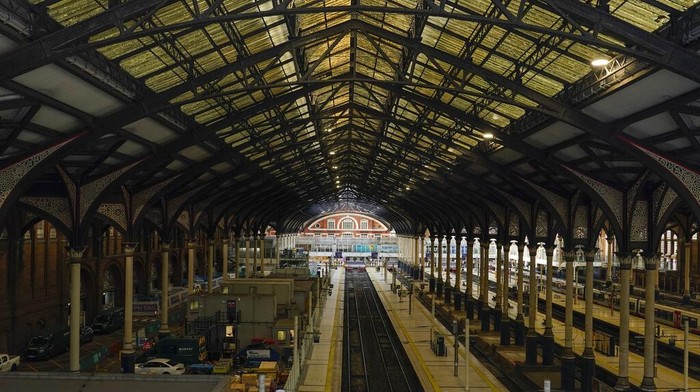A near empty Liverpool Street station, in London, Tuesday, June 21, 2022. Britains biggest rail strike in decades went ahead Tuesday after last-minute talks between a union and train companies failed to reach a settlement over pay and job security. Up to 40,000 cleaners, signalers, maintenance workers and station staff are due to walk out for three days this week, on Tuesday, Thursday and Saturday. (AP Photo/Alberto Pezzali)