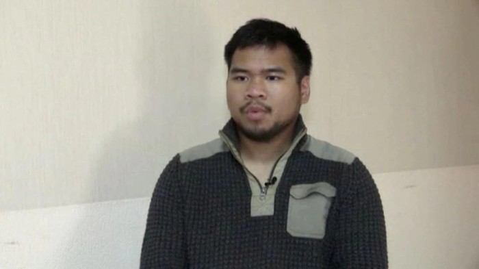 A still image taken from Russian state TV footage that it said shows Andy Huynh, a U.S. citizen captured by Russian forces while fighting for Ukraine, at an unknown location, in a still image from a video released on June 17, 2022. Video released June 17, 2022. RU-RTR/Handout via REUTERS TV