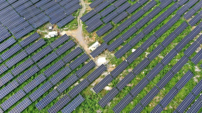 ANLONG, CHINA - JUNE 21, 2022 - An aerial photo taken on June 21, 2022 shows a photovoltaic power station in Xinjie Village, Puping Town, Anlong County, Buyi and Miao Autonomous Prefecture of Qiannan, Southwest Chinas Guizhou Province. In recent years, Guizhou province has taken advantage of barren hillsides to develop photovoltaic power stations and promote the construction of green and clean energy. (Photo credit should read CFOTO/Future Publishing via Getty Images)