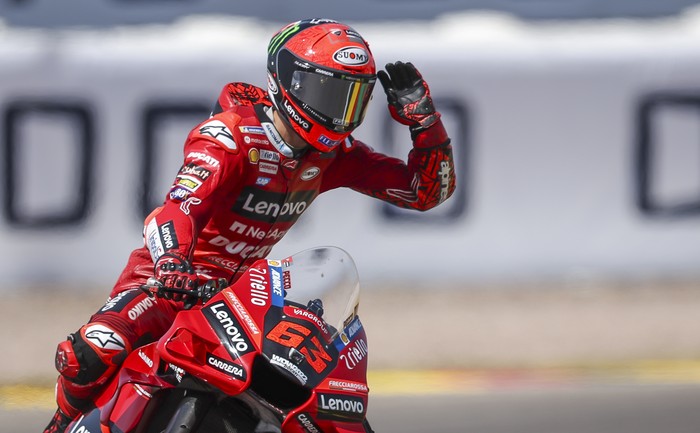 18 June 2022, Saxony, Hohenstein-Ernstthal: Motorsport/Motorcycle, German Grand Prix, MotoGP, Qualifying at Sachsenring. Francesco Bagnaia from Italy of the Ducati Lenovo Team cheers after his victory in qualifying. Photo: Jan Woitas/dpa (Photo by Jan Woitas/picture alliance via Getty Images)