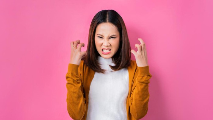 Asian woman are very angry.concept in studio
