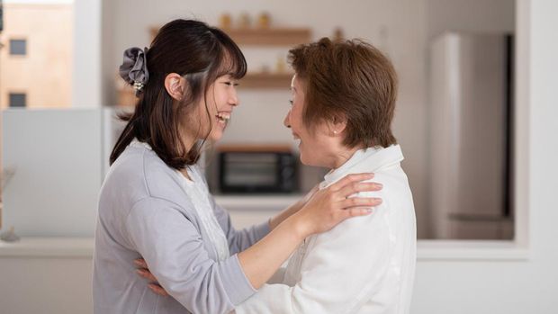 Wife feeling confusion, husband and mother-in-law discussing relationship