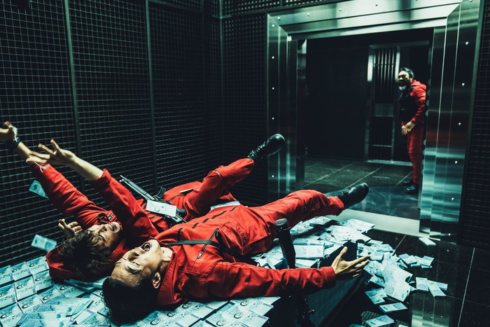 Money Heist Korea: JEA (L to R) Lee Hyun-woo as Rio, Kim Ji-hun as Denver and Lee Won-jong as Moscow in episode # 1 of Money Heist Korea: JEA. Cr. Jung Jaegu/Netflix © 2021