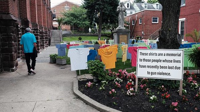HARRISBURG, PENNSYLVANIA - JUNE 22: Shirts representing victims of gun violence in Harrisburg are displayed in a memorial at St. Francis Catholic Church on June 22, 2022 in Harrisburg, Pennsylvania. The gun violence awareness memorial was installed by the Harrisburg Chapter of Heeding God’s Call to End Gun Violence. The memorial includes 64 shirts with the names, ages and dates of death of those killed in gun violence  in Harrisburg and neighboring communities from 2019 through the present. Since 2009, 199 people have been fatally shot in the capital city. (Photo by Spencer Platt/Getty Images)