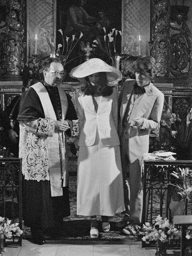 Mick and Bianca Jagger with the officiating priest at their wedding at the Church of St. Anne, St Tropez, 12th May 1971. (Photo by Reg Lancaster/Daily Express/Hulton Archive/Getty Images)