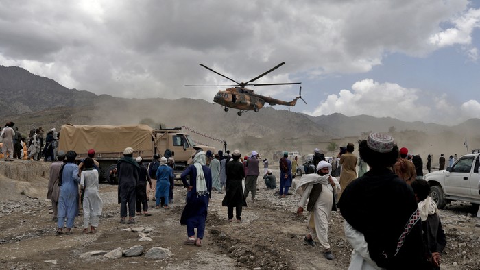 A Taliban helicopter carrying aid lands in an earthquake affected area in Gayan, Afghanistan, June 23, 2022. Picture taken June 23, 2022. REUTERS/Ali Khara