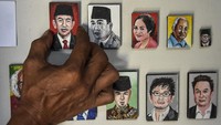 Lukisan mini 100 tokoh dunia yang dibuat Iwan ini akan dipamerankan pada Agustus 2022 mendatang.