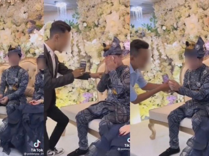 Viral sahabat memberikan hadiah kondom untuk temannya yang sedang menikah di atas pelaminan. Viral sahabat memberikan hadiah kondom untuk temannya yang sedang menikah di atas pelaminan.