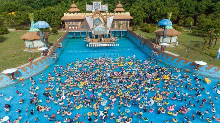 NANJING, CHINA - JUNE 25: Aerial view of people enjoying themselves at a swimming pool to beat the heat on June 25, 2022 in Nanjing, Jiangsu Province of China. (Photo by Xue Jinlong/VCG via Getty Images)
