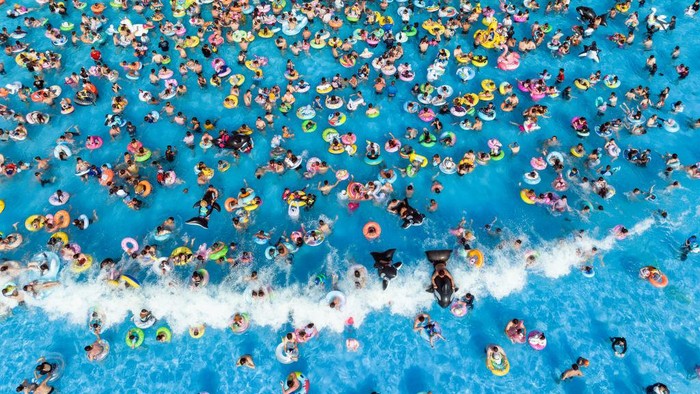 NANJING, CHINA - JUNE 25: Aerial view of people enjoying themselves at a swimming pool to beat the heat on June 25, 2022 in Nanjing, Jiangsu Province of China. (Photo by Xue Jinlong/VCG via Getty Images)
