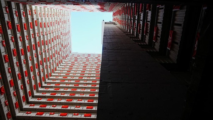 Rows of Chinese and Hong Kong flags decorate a residential building, ahead of the 25th anniversary of Hong Kong's handover to China from Britain, in Hong Kong, China June 26, 2022. REUTERS/Lam Yik