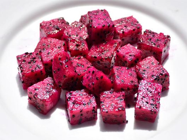 KHAGRACHARI, BANGLADESH - JUNE 22: A view of exotic dragon fruit farm in Khagrachari hills, in Bangladesh on June 22, 2022. Exotic dragon fruit is commercially cultivated in Khagrachari hills. This Thai fruit which became popular in a short time is known as Dragon Fruit in Bangladesh. In addition to native fruits, dragon fruit has taken its place in the fruit market of this country. (Photo by Mohammad Shajahan/Anadolu Agency via Getty Images)