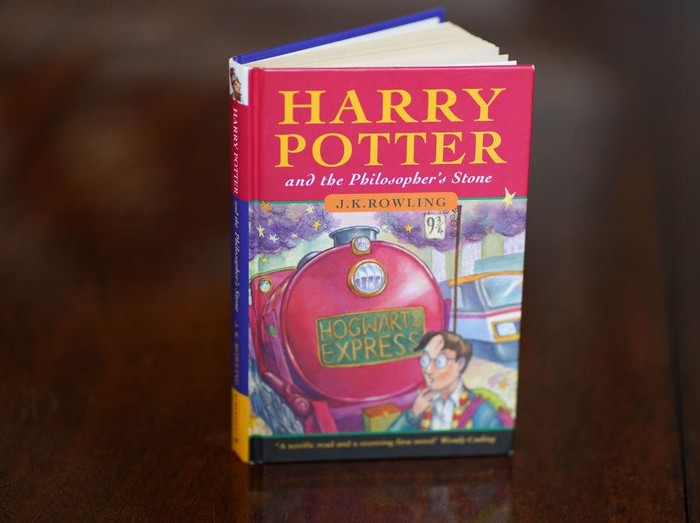 A pristine first edition hardback of JK Rowlings Harry Potter and the Philosophers Stone, one of only 500 produced in the first print run in 1997, on display at Hansons Auctioneers at Bishton Hall, Staffordshire. The book has never been read and was kept in darkness for 25 years inside a protective sleeve and could fetch up to £100,000 when it goes under the hammer at Hansons Library Auction on March 9. Picture date: Monday March 7, 2022. (Photo by Jacob King/PA Images via Getty Images)