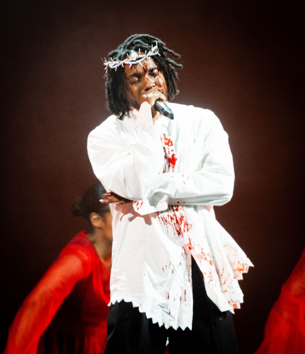 GLASTONBURY, ENGLAND - JUNE 26: Kendrick Lamar performs as he headlines the Pyramid Stage during day five of Glastonbury Festival at Worthy Farm, Pilton on June 26, 2022 in Glastonbury, England. (Photo by Samir Hussein/WireImage)