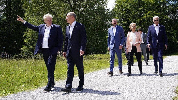 From left, President Emmanuel Macron, US President Joe Biden, European Commission President Ursula von der Leyen and Canada's Prime Minister Justin Trudeau leave after posing for a group photo , during the G7 Summit, at Castle Elmau in Kruen, near Garmisch-Partenkirchen, Germany, Sunday, June 26, 2022. The Group of Seven leading economic powers are meeting in Germany for their annual gathering Sunday through Tuesday. (Brendan Smialowski/Pool via AP)