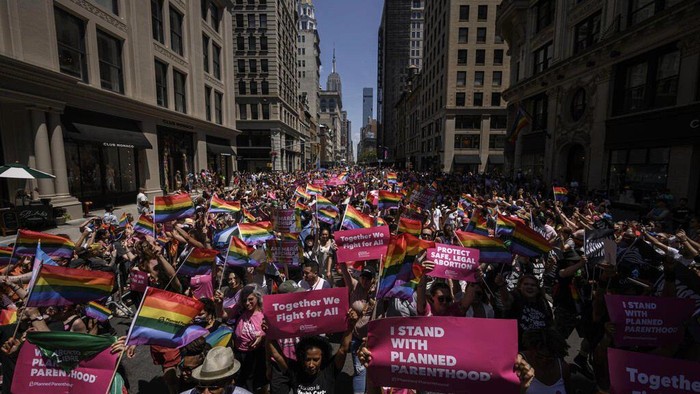Participants marched through lower Manhattan in the blazing sunshine during the march, the first time it has been held since the pandemic began Ed JONES AFP