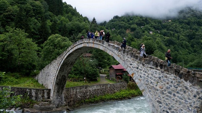 Visited by tourists Cinciva Bridge in Camlihemsin district of Rize on 26 June 2022 (Photo by Resul Kaboglu/NurPhoto via Getty Images)