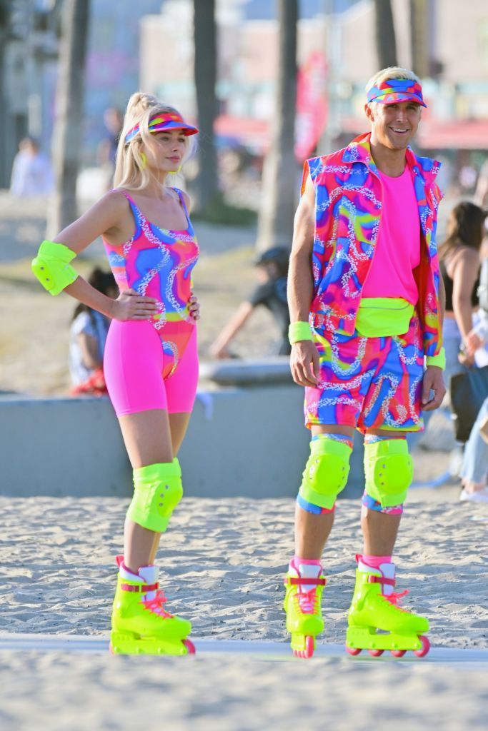 LOS ANGELES CA - JUNE 27:  Margot Robbie and Ryan Gosling on rollerblades film new scenes for 'Barbie' in Venice California. 27 Jun 2022. (Photo by MEGA/GC Images)