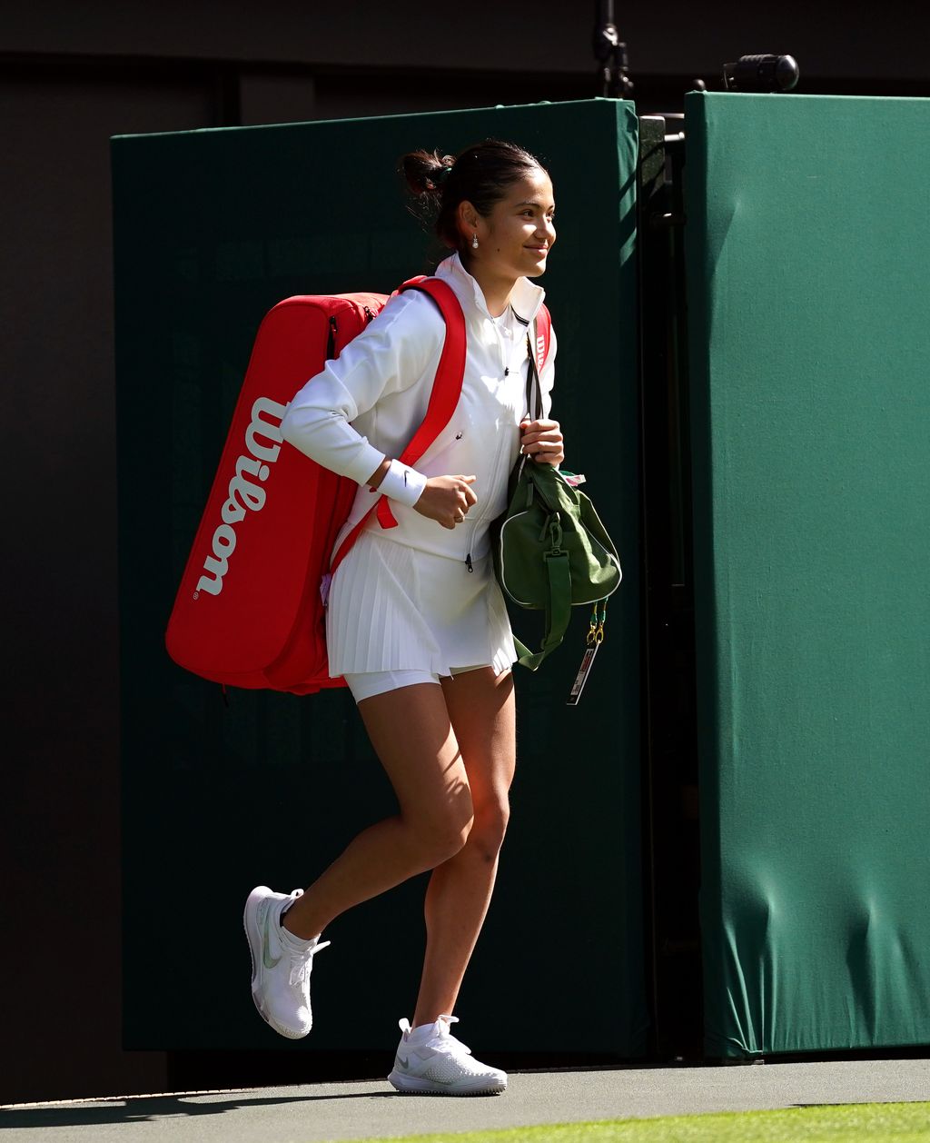 Emma Raducanu celebrates victory over Alison Van Uytvanck on day one of the 2022 Wimbledon Championships at the All England Lawn Tennis and Croquet Club, Wimbledon. Picture date: Monday June 27, 2022. (Photo by Adam Davy/PA Images via Getty Images)