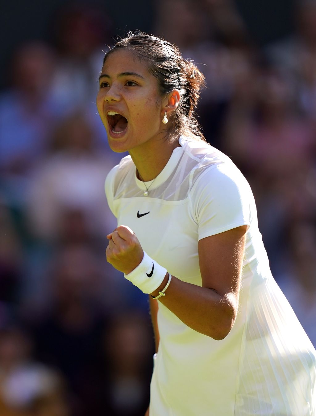 Emma Raducanu celebrates victory over Alison Van Uytvanck on day one of the 2022 Wimbledon Championships at the All England Lawn Tennis and Croquet Club, Wimbledon. Picture date: Monday June 27, 2022. (Photo by Adam Davy/PA Images via Getty Images)