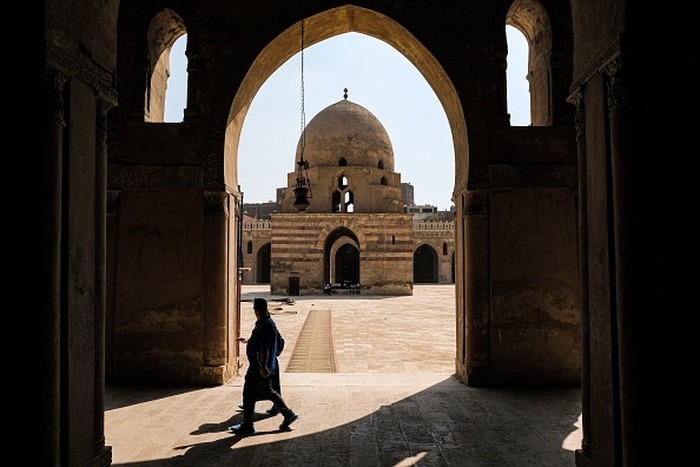 CAIRO, EGYPT - JUNE 12: A view from the Mosque of Ibn Tulun in Egyptian capital Cairo on June 12, 2022. It is the largest mosque in Cairo in terms of land size and one of the oldest mosques in Egypt and all of Africa still standing in its entirety. It is surrounded by an open square courtyard, which allows for the passage of natural light. The Ibn Tulun Mosque showcases ancient Egyptian architectural designs, with its ornamentation made of sculpted stucco and wood. The mosque is a well-liked tourist destination. (Photo by Mohamed Abdel Hamid/Anadolu Agency via Getty Images)