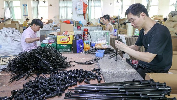 JINJIANG, CHINA - JUNE 24 2022: Workers make umbrellas in a factory in Jinjiang city in southeast Chinas Fujian province Friday, June 24, 2022. (Photo credit should read YUAN HE/ Feature China/Future Publishing via Getty Images)