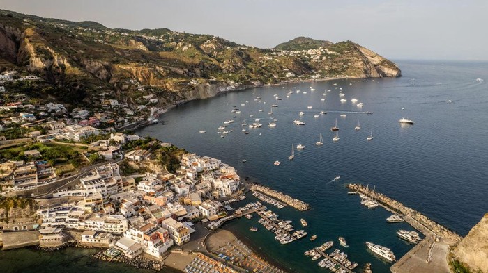 A drone view of Sant'Angelo d'Ischia, in Ischia, Italy, on June 26, 2022. Ischia is a volcanic island in the Gulf of Naples, Italy. It's known for its mineral-rich thermal waters. (Photo by Manuel Romano/NurPhoto via Getty Images)