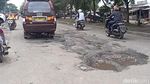 Hati-hati! Banyak Jalan Berlubang di Palembang