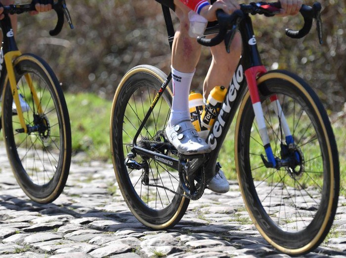 Illustration shows close up on riders in action during preparations ahead of the 119th edition of the Paris-Roubaix one day cycling race, from Compiegne, near Paris to Roubaix, Thursday 14 April 2022. This is the first time since 2019 that the race can be held again in April, as previous editions were cancelled or postponed due to the Covid-19 pandemic.
BELGA PHOTO LUC CLAESSEN (Photo by LUC CLAESSEN / BELGA MAG / Belga via AFP) (Photo by LUC CLAESSEN/BELGA MAG/AFP via Getty Images)